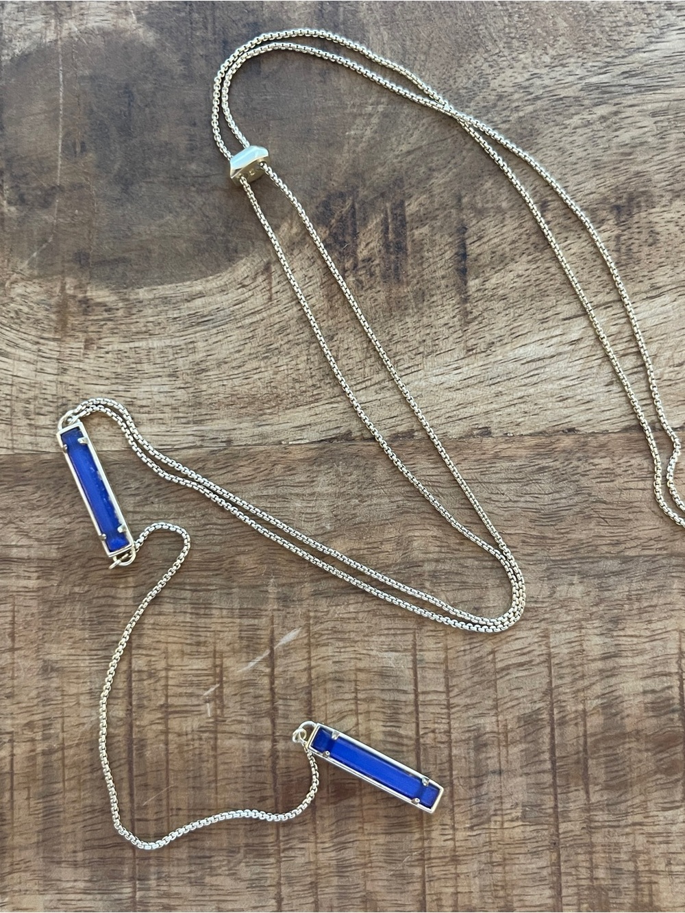 Kendra Scott lariat necklace in blue and gold